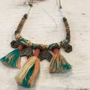 Ettika necklace with beads charms and tassels